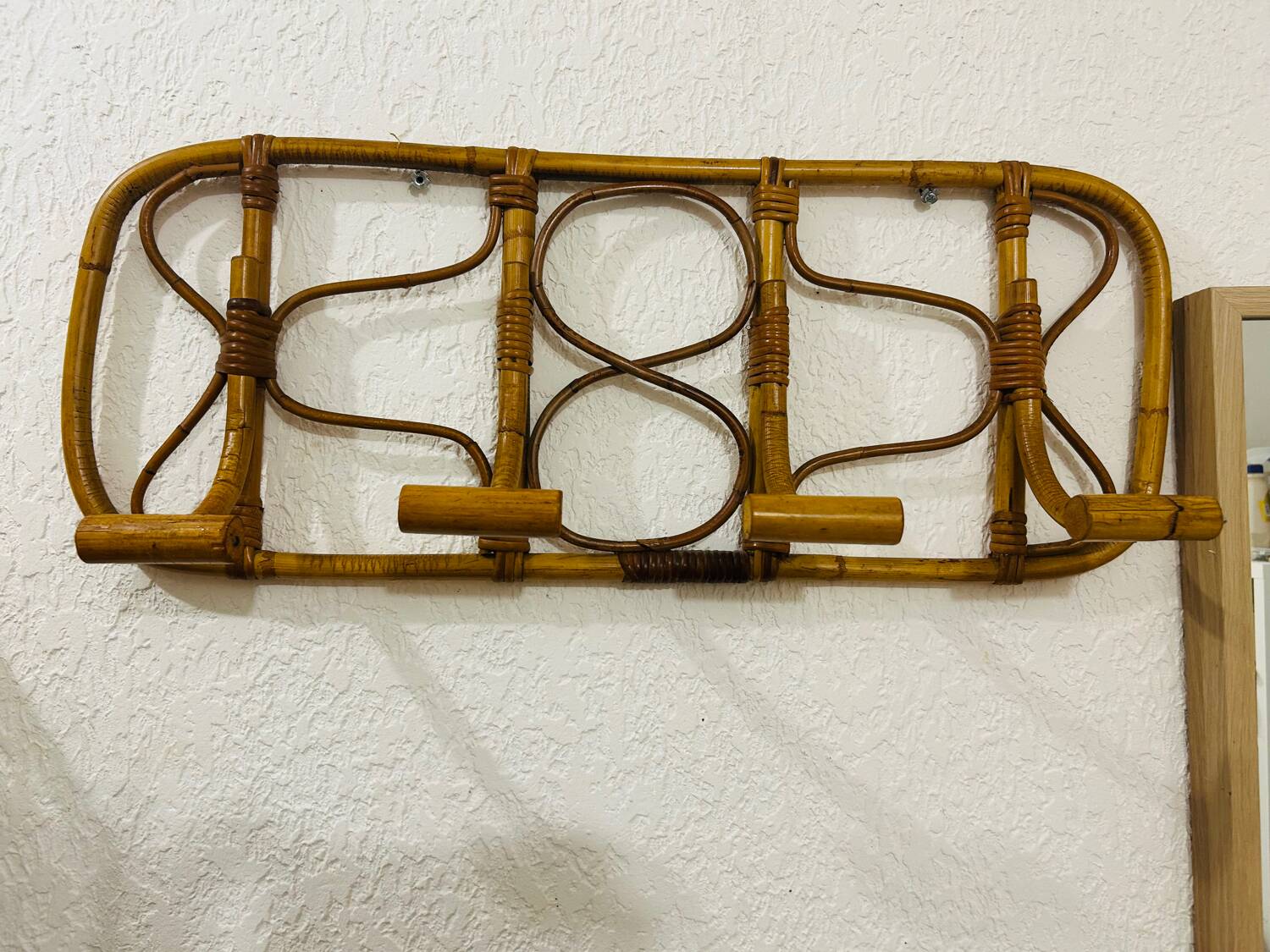 Vintage rattan wall-mounted coat rack