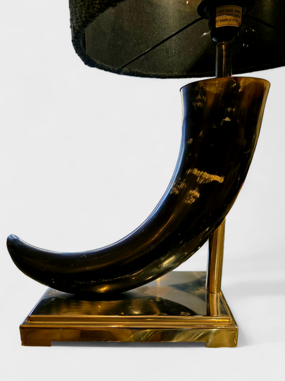 Brutalist lamp made from cow horn.