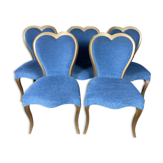5 blue velvet chairs heart patterns