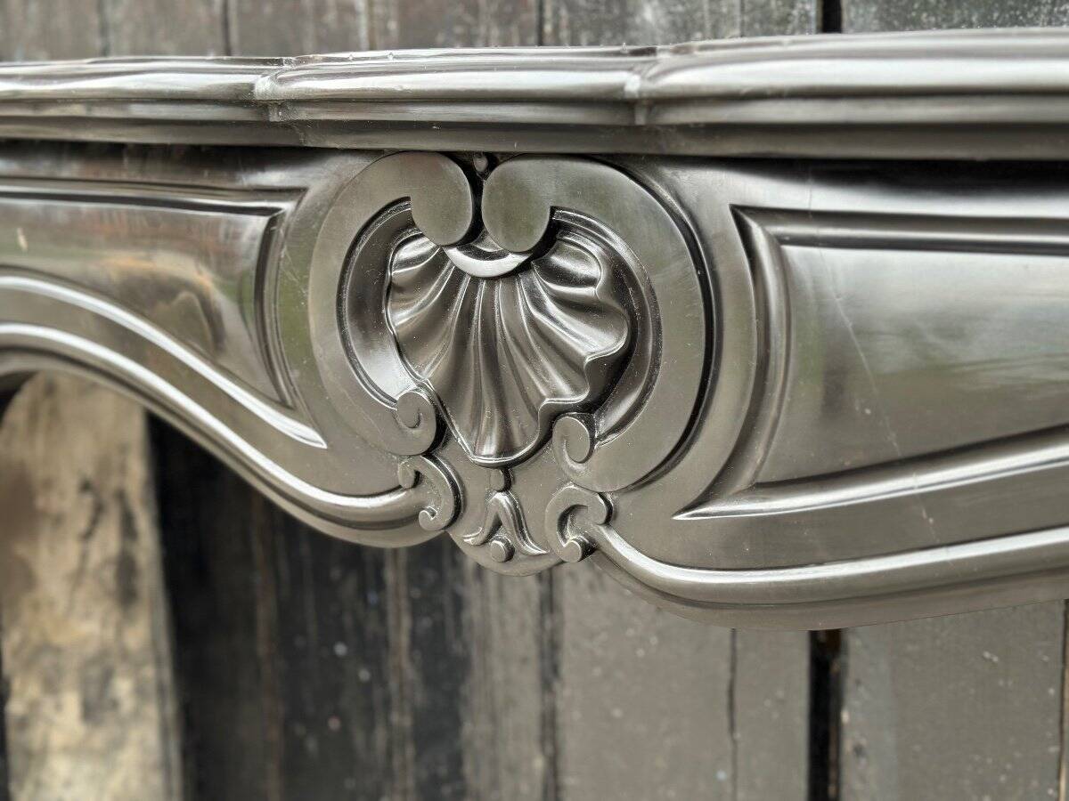 Louis XV style fireplace in black Belgian marble circa 1880