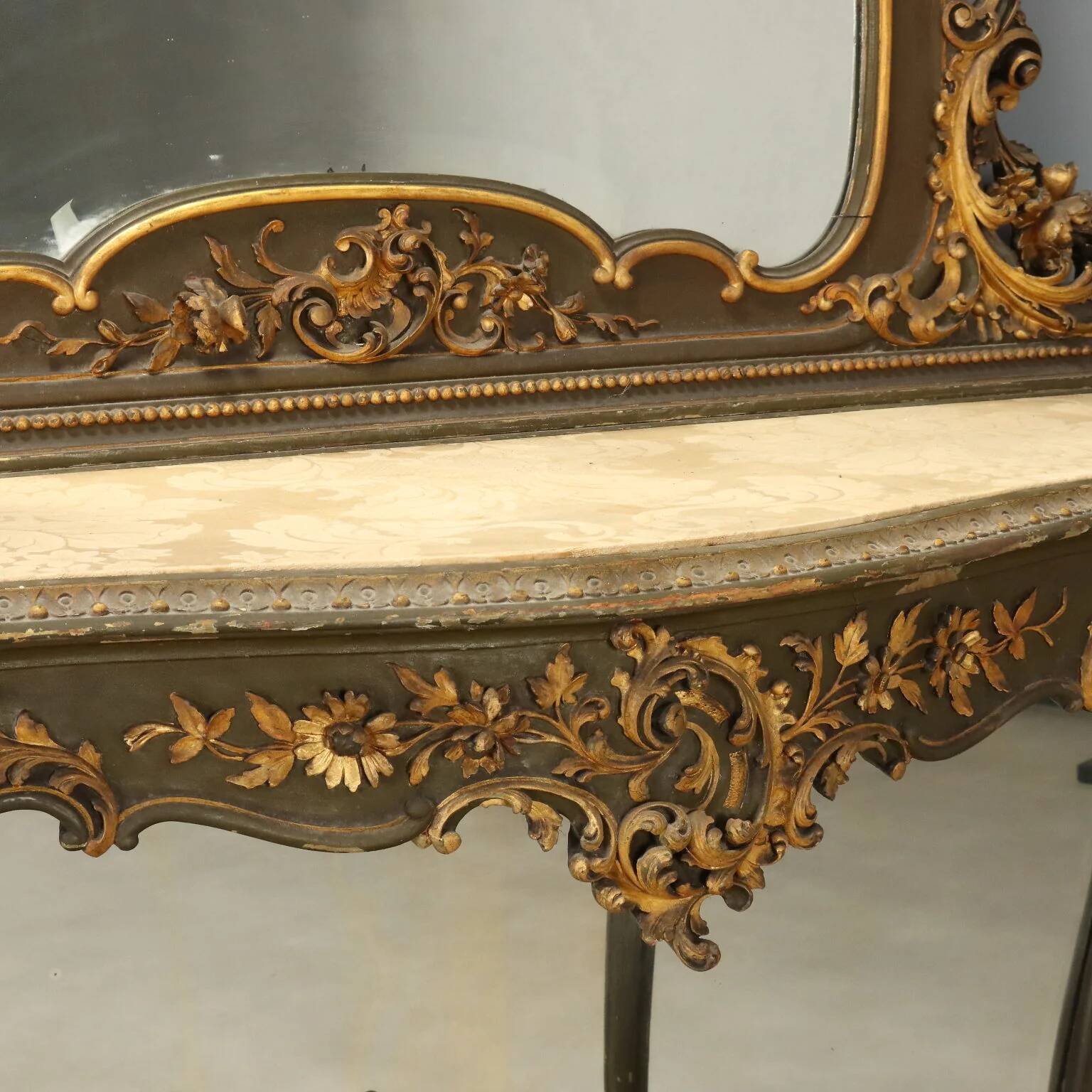 Ancient baroque console with a wooden mirror, Italy, late 19th century.