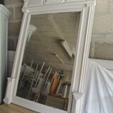Antique bevelled mirror, frame in pearl grey patinated wood.