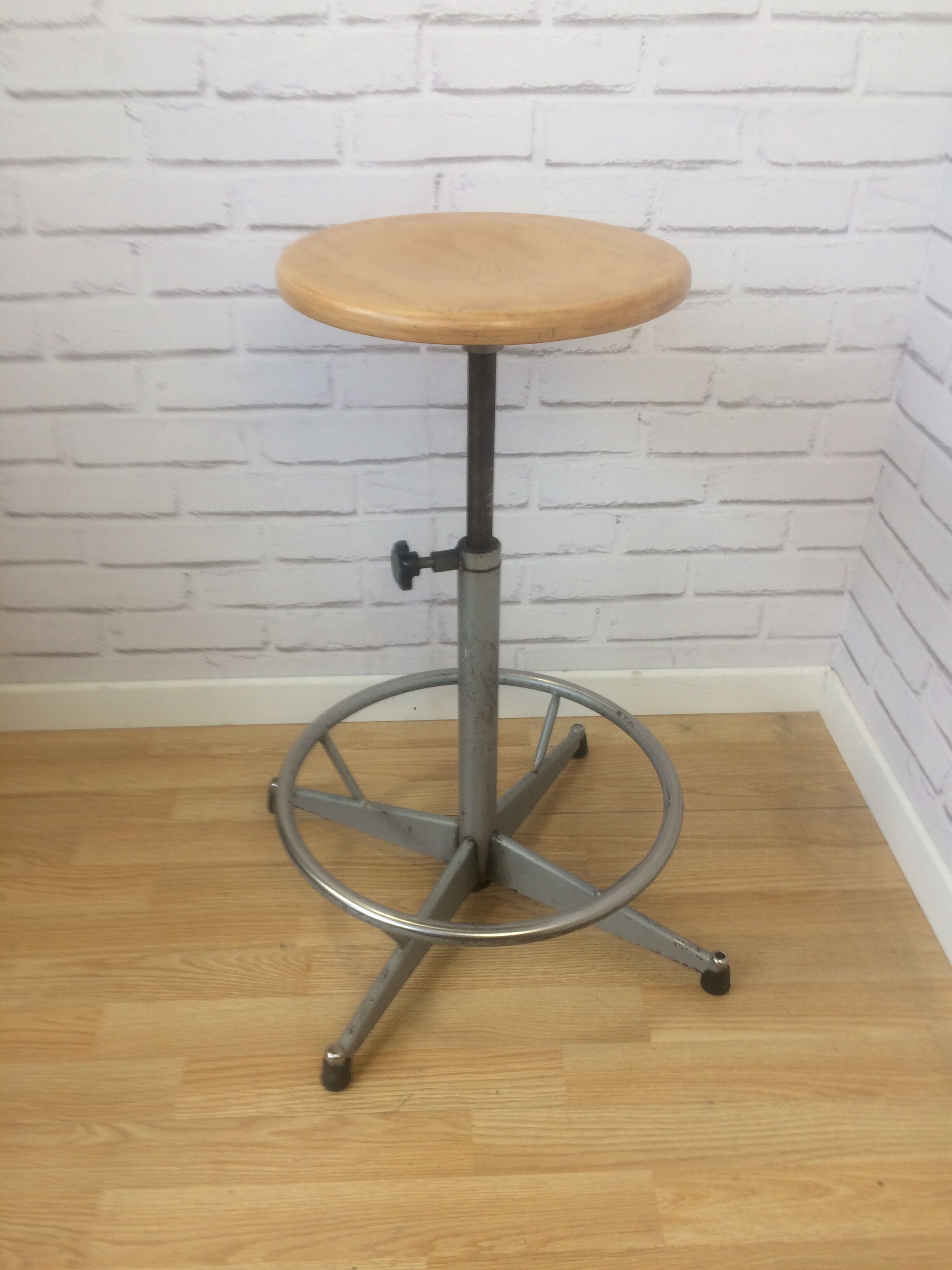 Industrial stool adjusted height