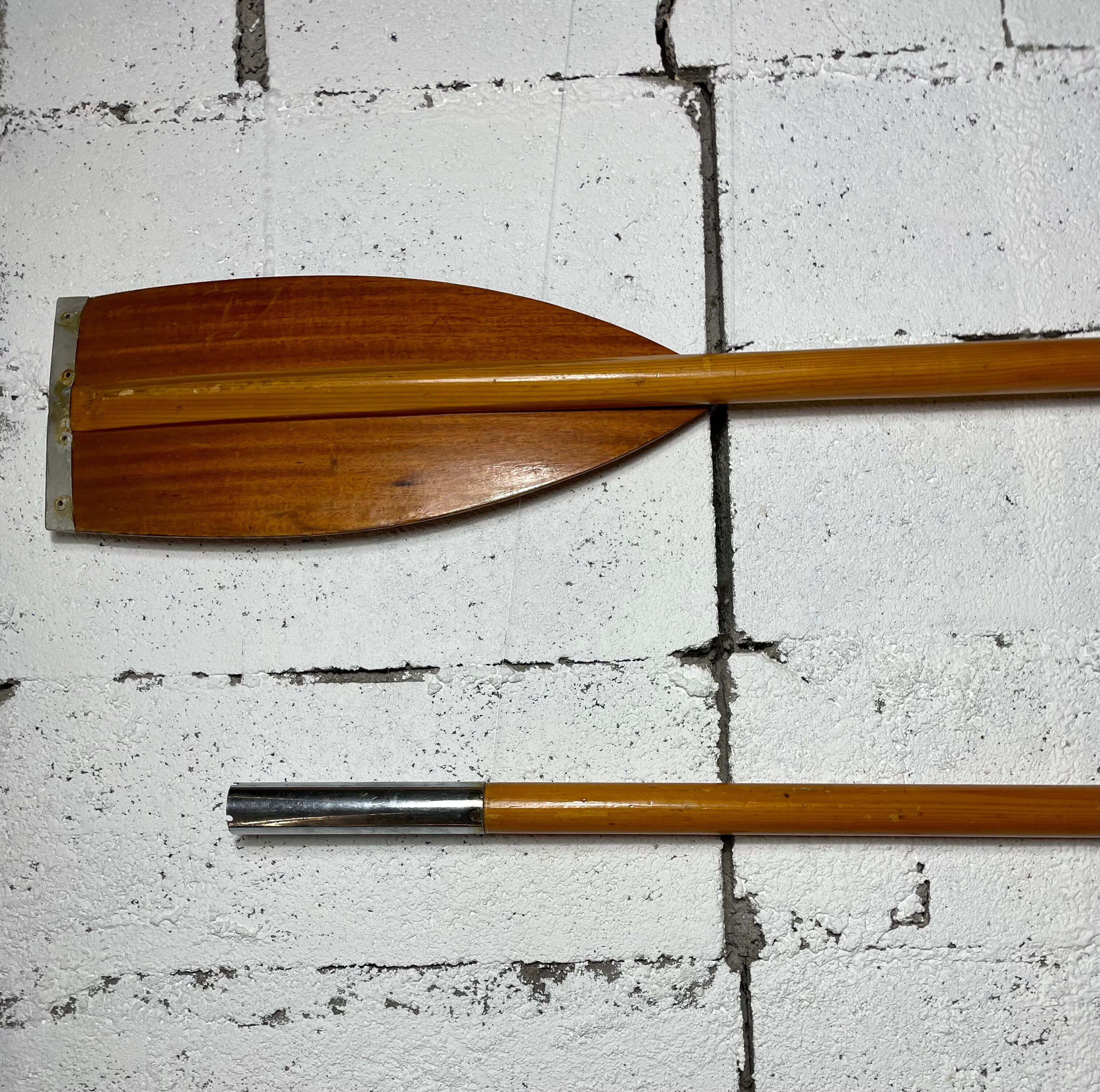 Pair of old wooden paddles