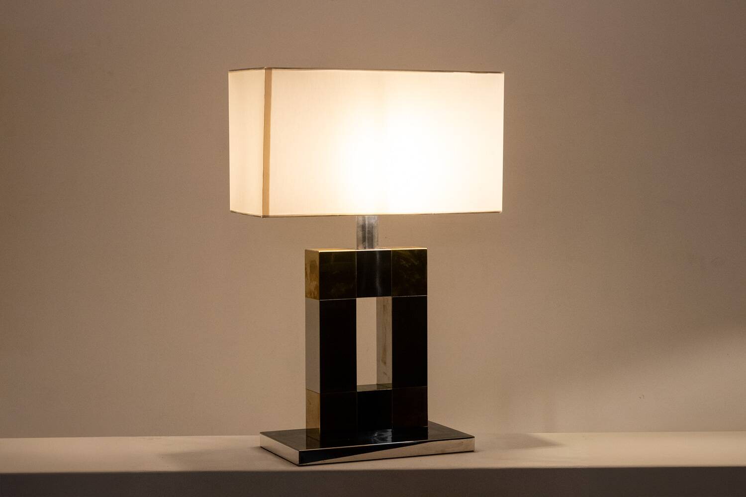 Geometric lamp in silver and gold metal. 1970s.