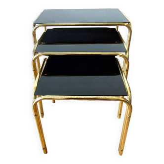 Vintage 1970 gold metal nesting tables.