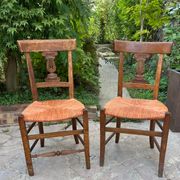 Pair of straw seated chairs
