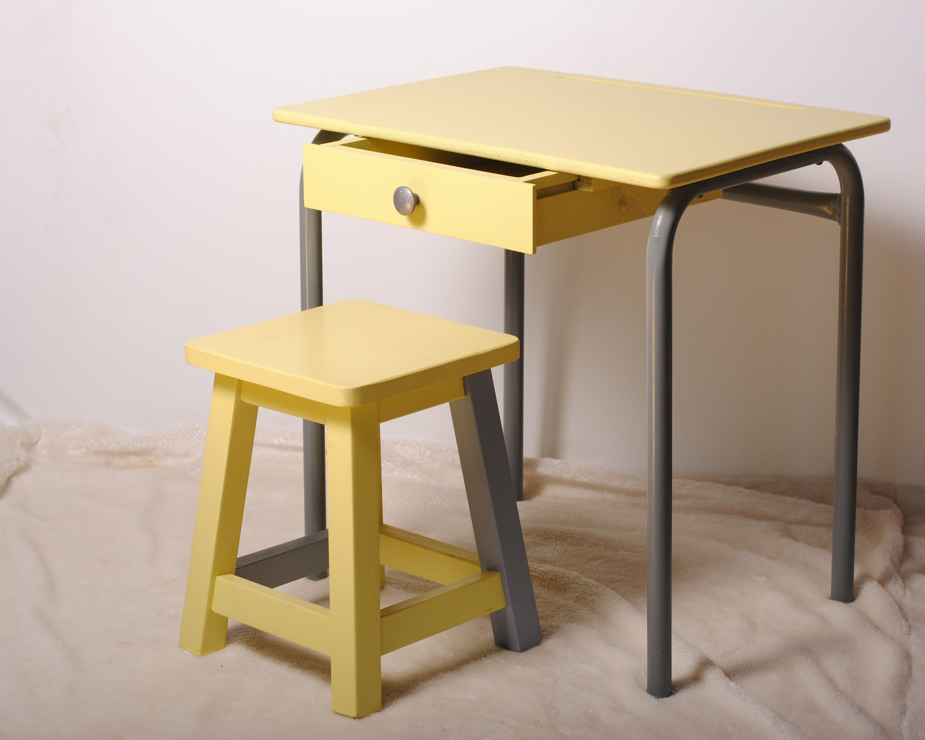 Yellow child office with his stool