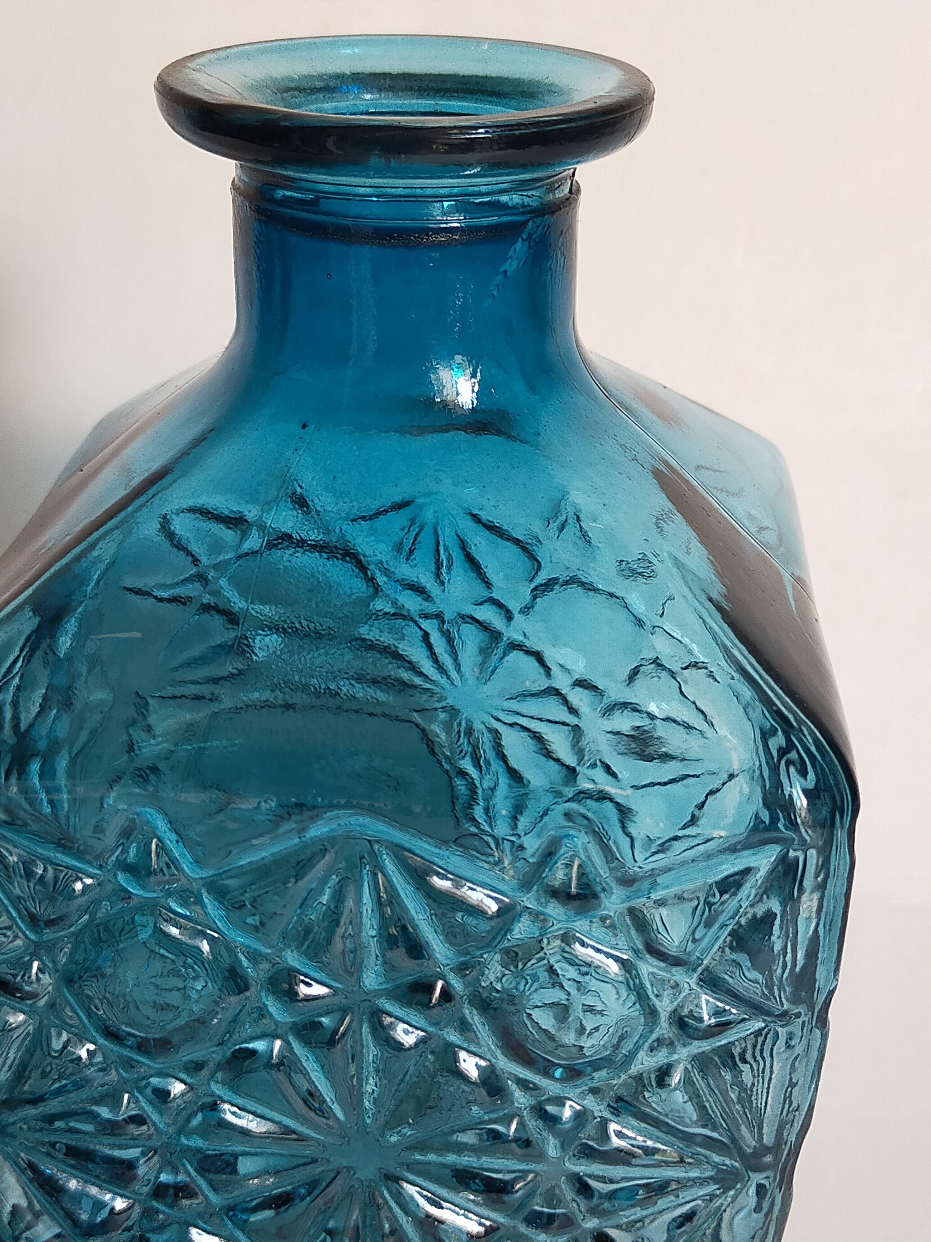 Vintage blue glass whiskey decanter