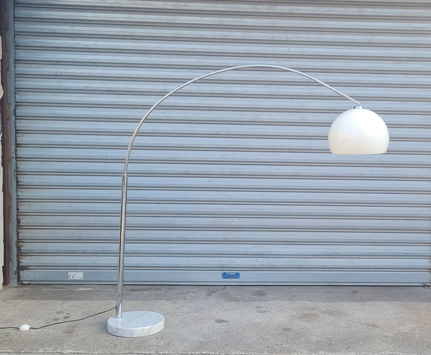 Arch floor lamp by Harvey guzzini 1970