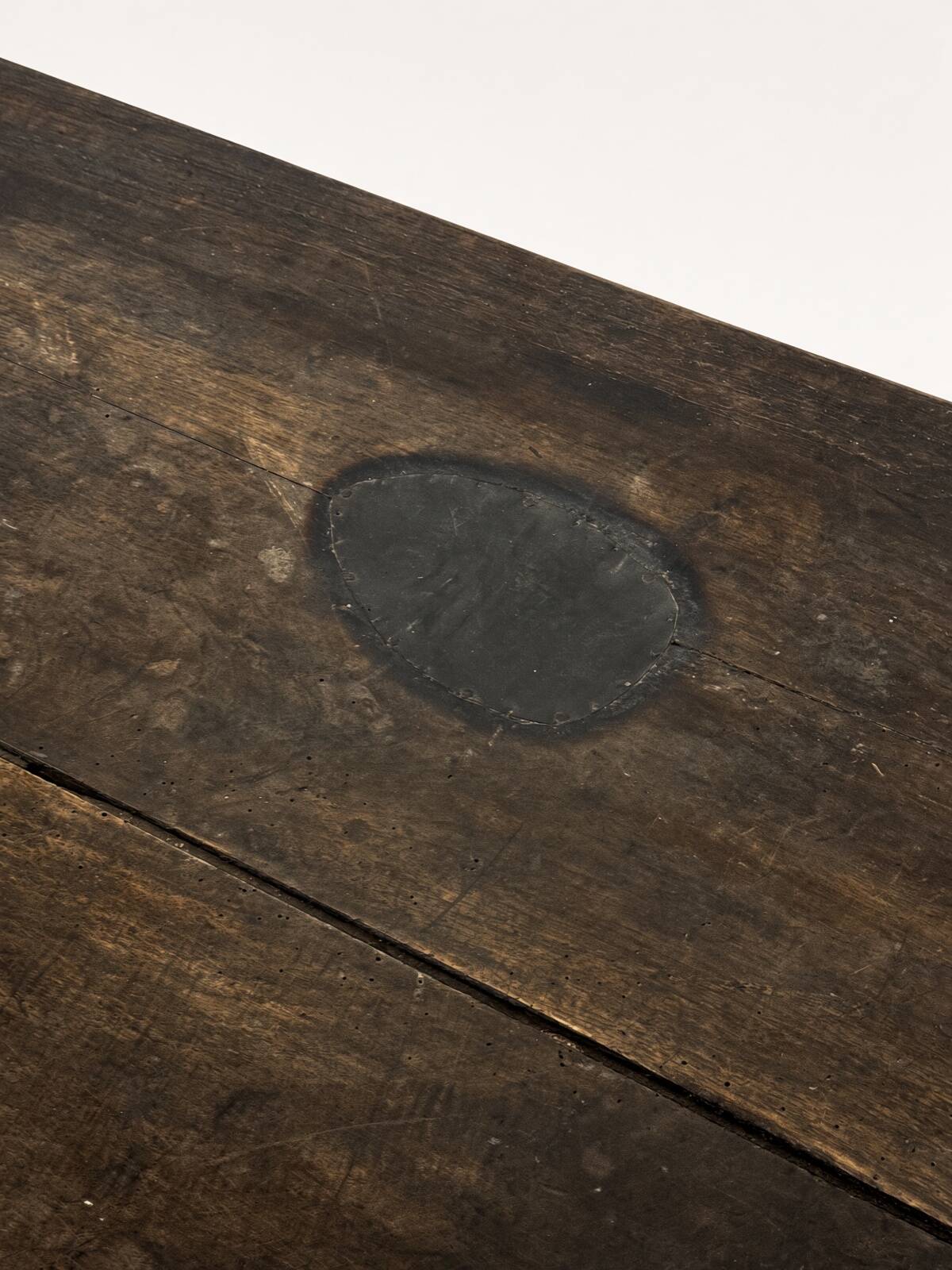 Narrow old wooden farmhouse table