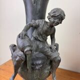 François Moreau: Pair of vases with Napoleon III period characters in regula with bronze patina