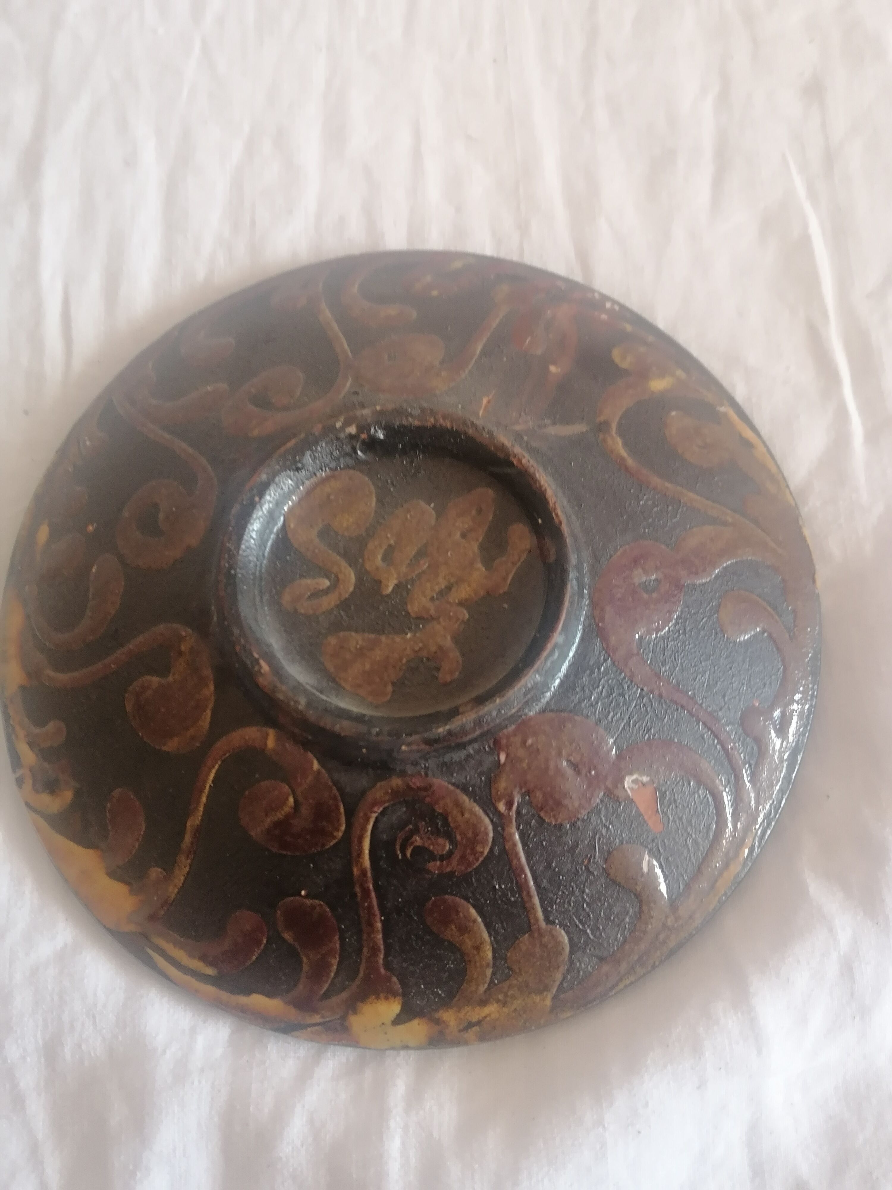 Old glazed terracotta plate. Safi. Year 69.