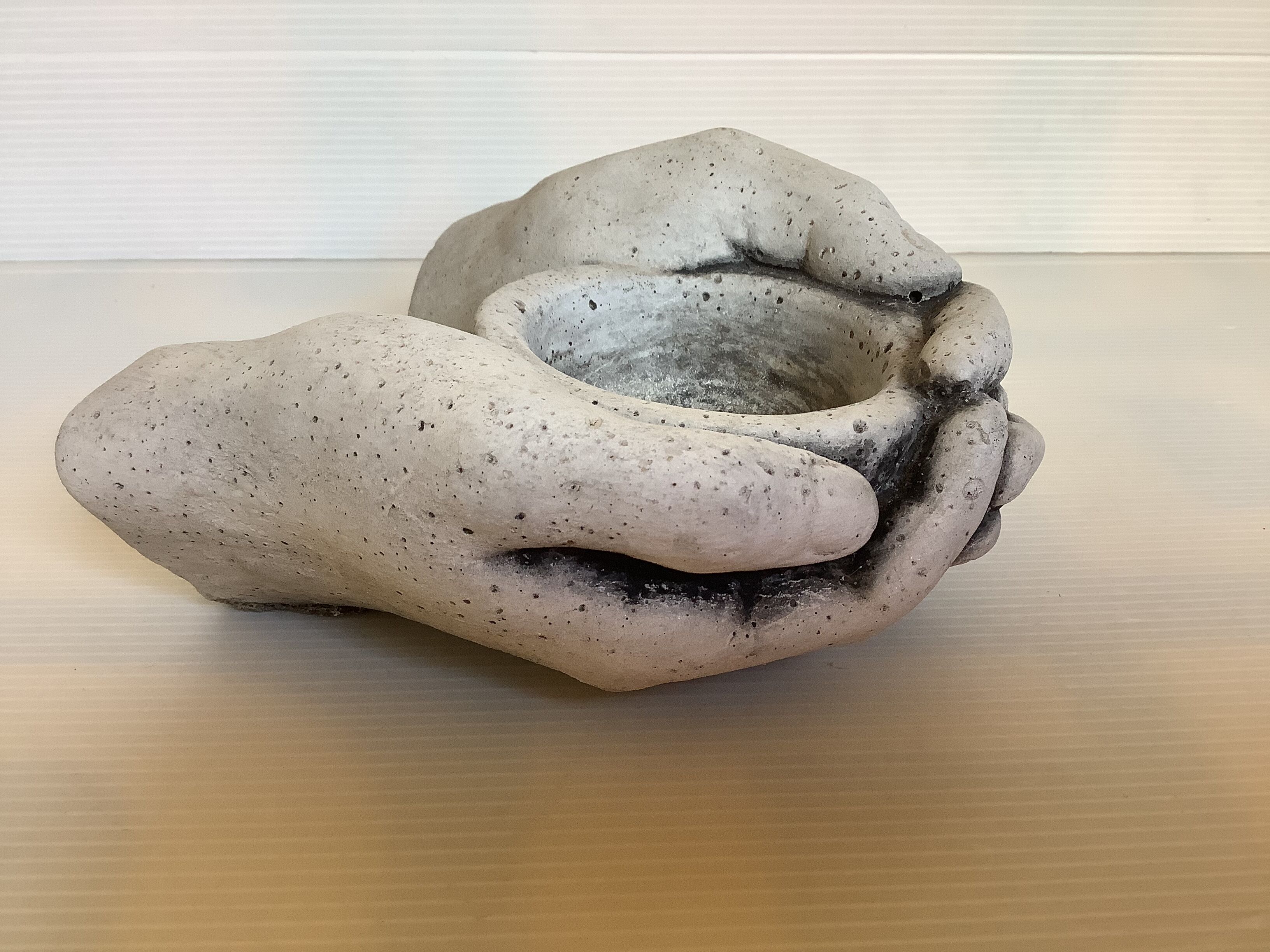 Hand candle holder gray black stone