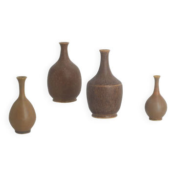 Set of 4 Scandinavian collectible vases in brown stoneware by Gunnar Borg.