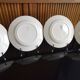 4 flat plates in earthenware, St Amand, Newton service