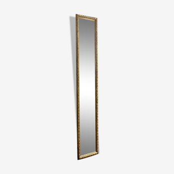 Old rectangular mirror between two golden Louis Philippe