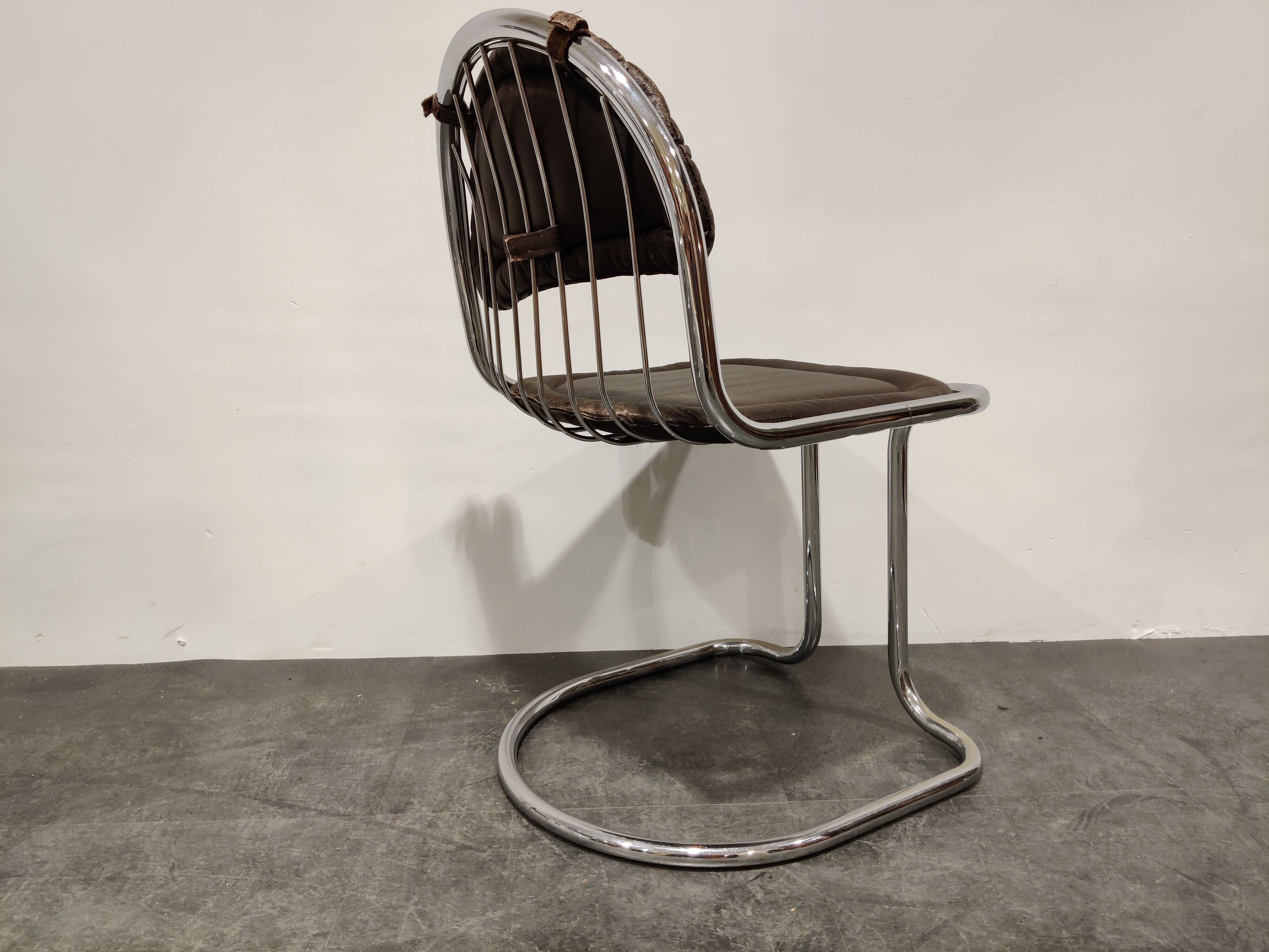 Vintage chrome and leather cantilever dining chairs, 1970s