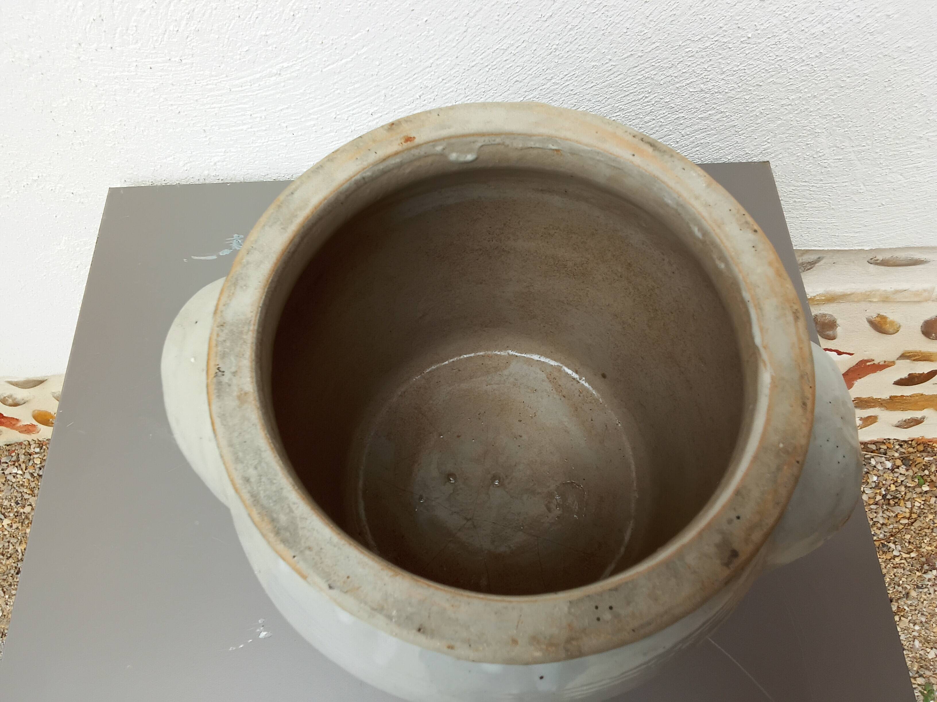 Beige enameled stoneware pot