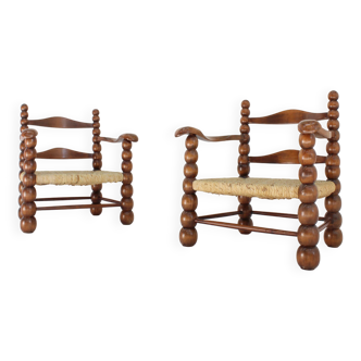 Ensemble de fauteuils en chêne et jonc, attribué à Charles Dudouyt, années 1940
