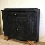 Matte black buffet and raw wood feet