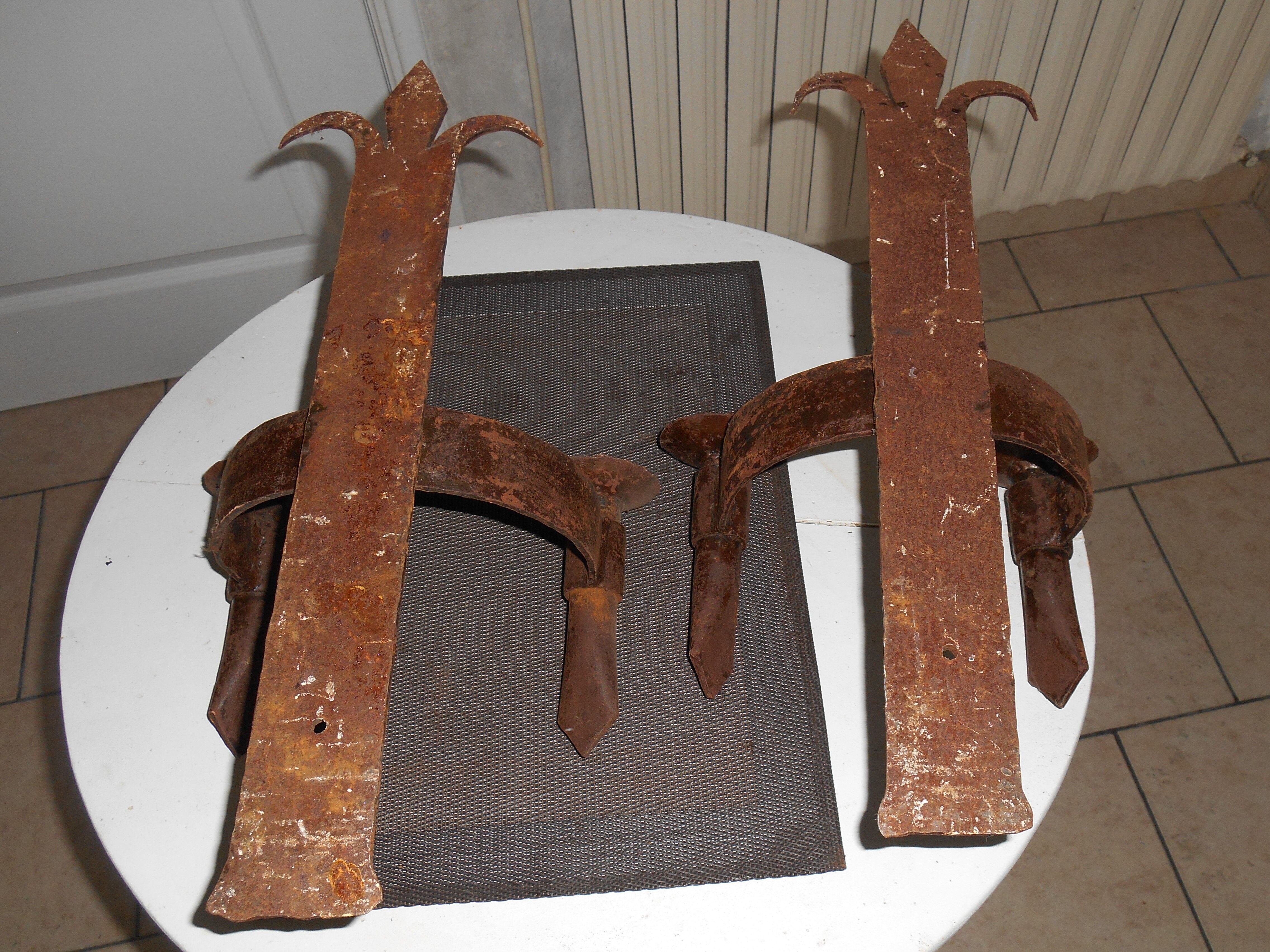 Pair of iron wall sconces