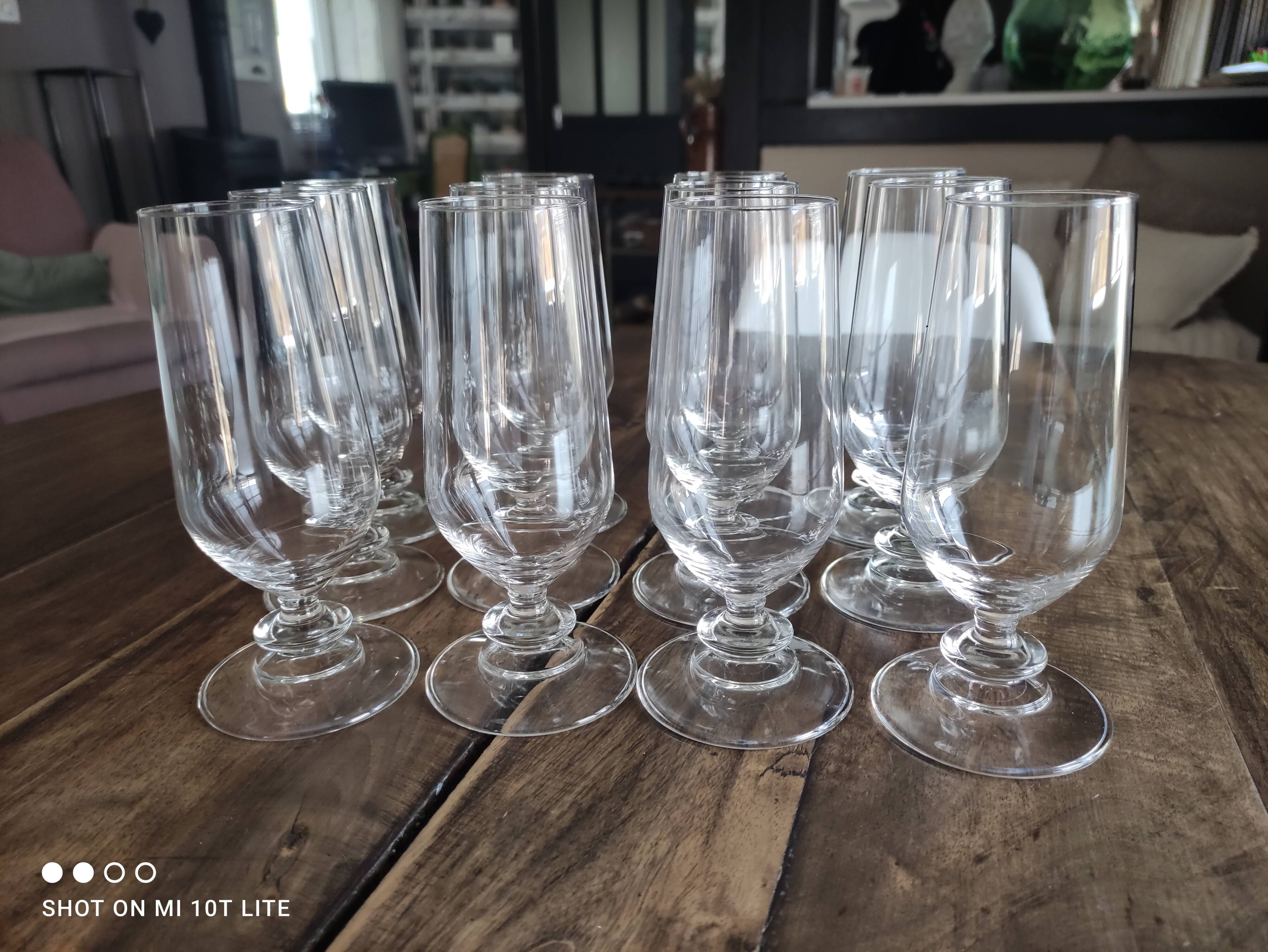 Set of 12 vintage champagne flutes on low crystalline stand