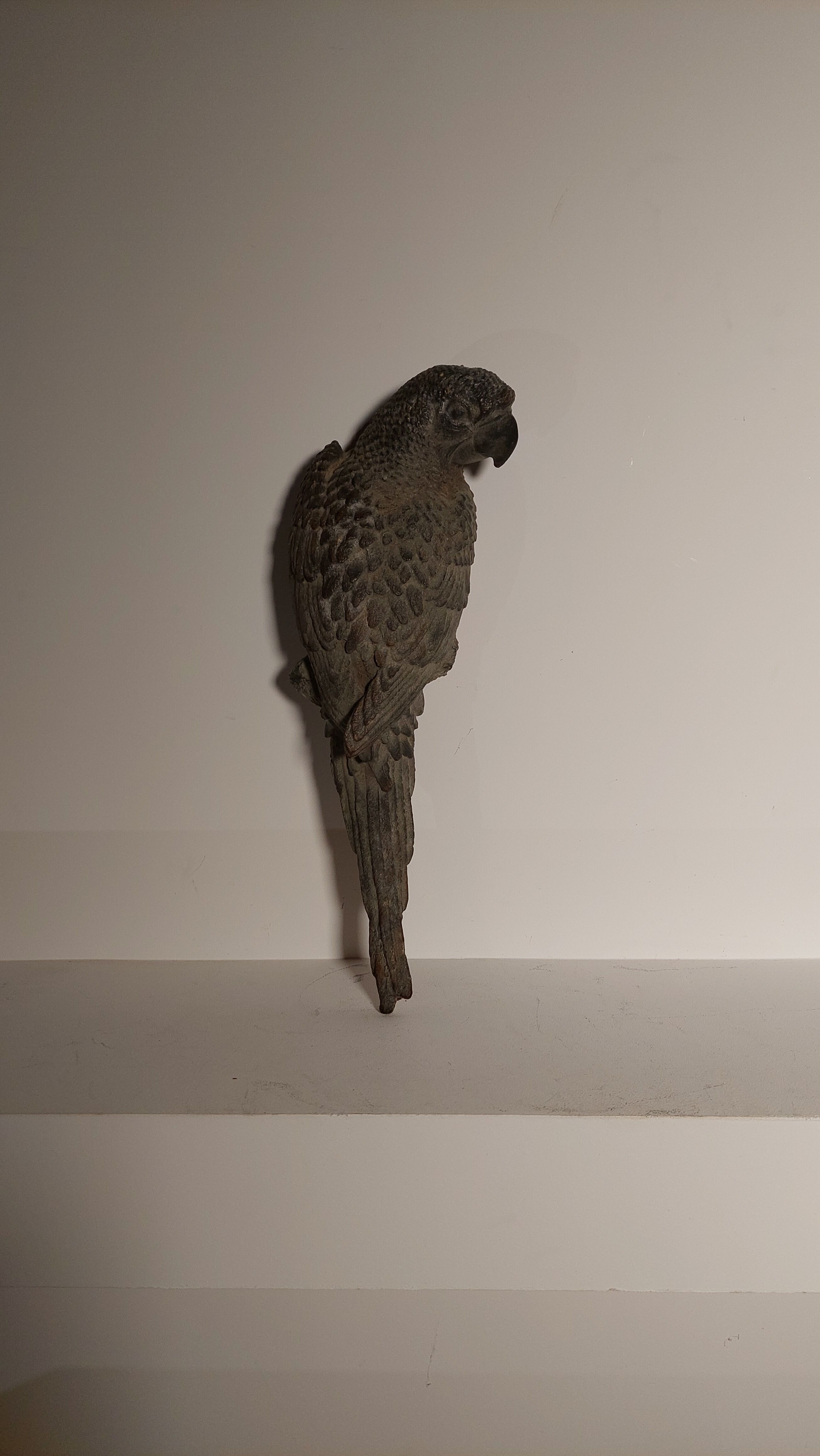 Decorative cast iron parrot
