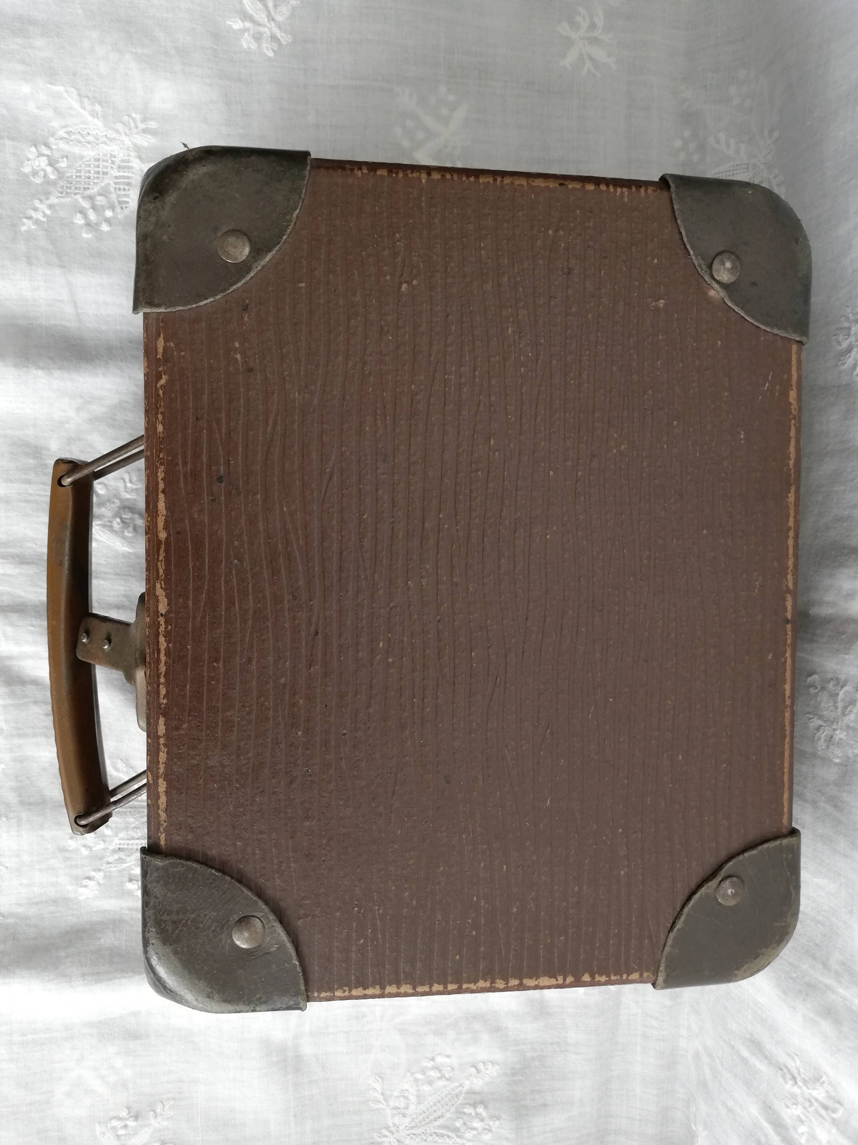 Old metal cardboard suitcase