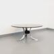Vintage round coffee table in glass, chromed metal and black metal Space Age style of the 70s