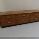 Vintage low TV cabinet from the 1950s with drawers.