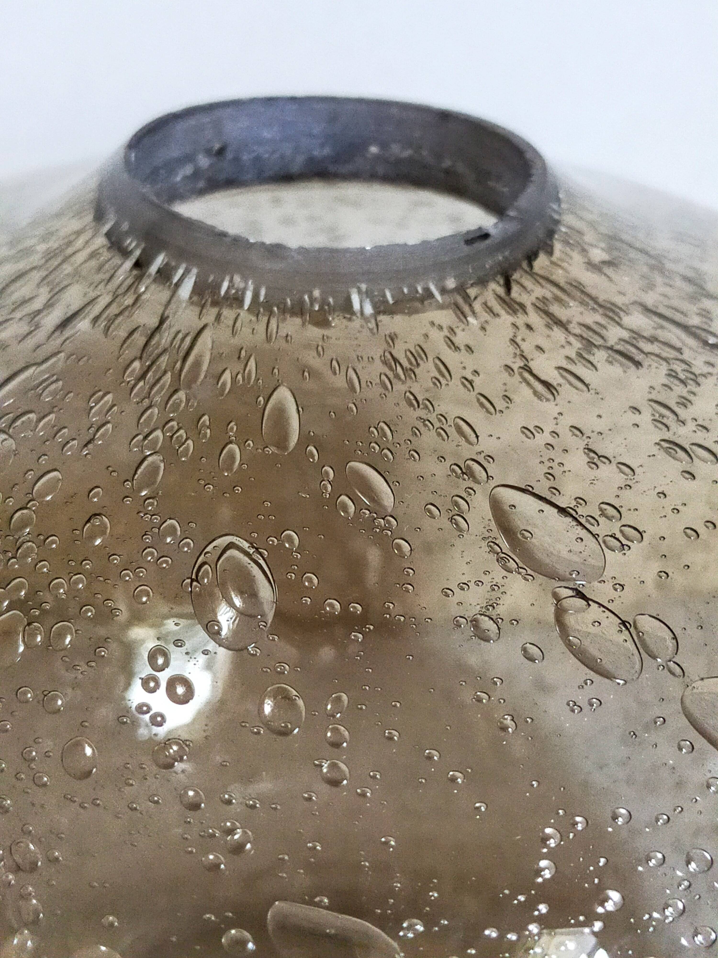 Vintage bubble-blown glass ball vase from riom france