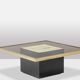 Coffee table in gilded brass and smoked glass. 1970s.