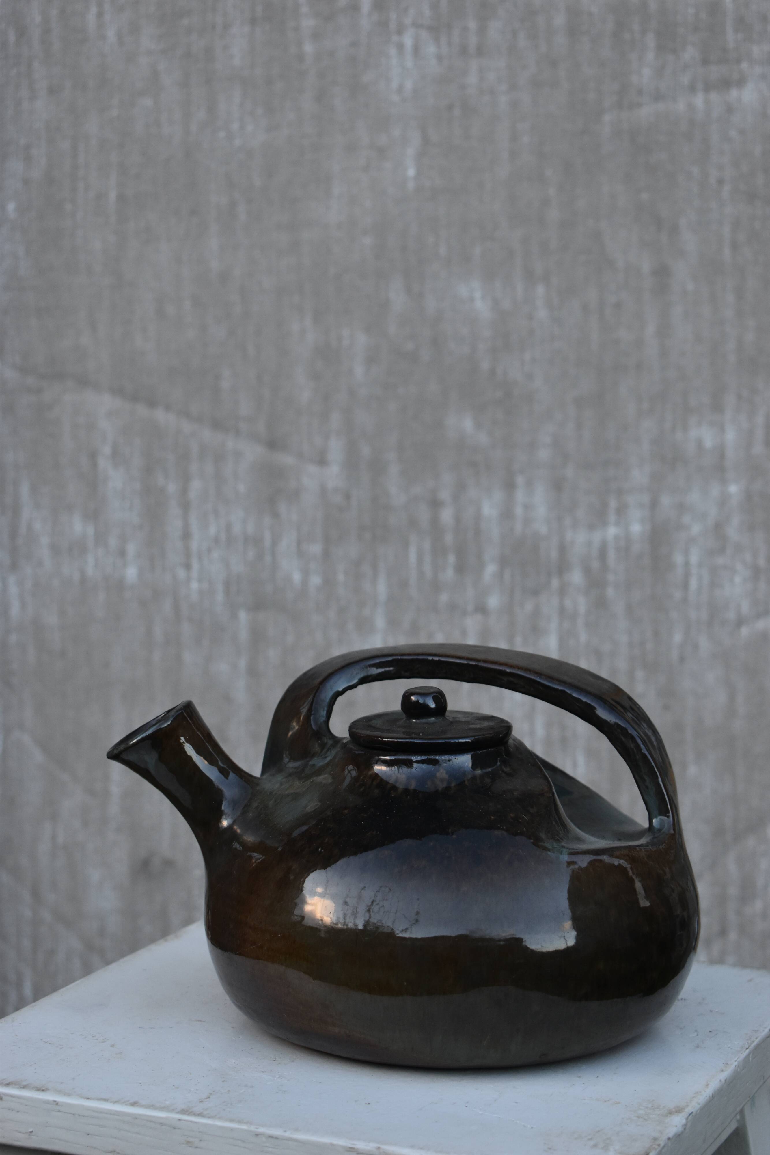 Glazed terracotta teapot