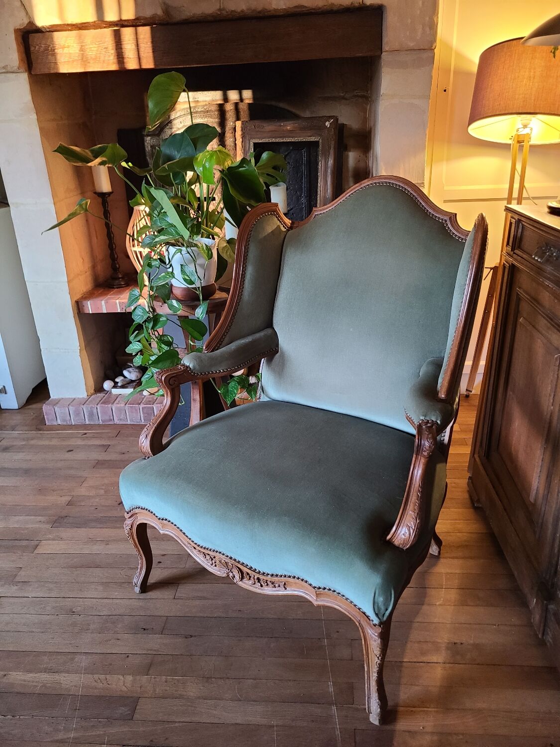 Vintage Louis XV style wing chair, light green velvet