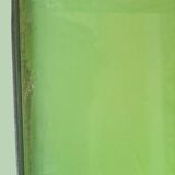 1960s side table with a lime green top, width 65.5 cm.