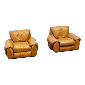 Set of two Italian cognac leather lounge chairs