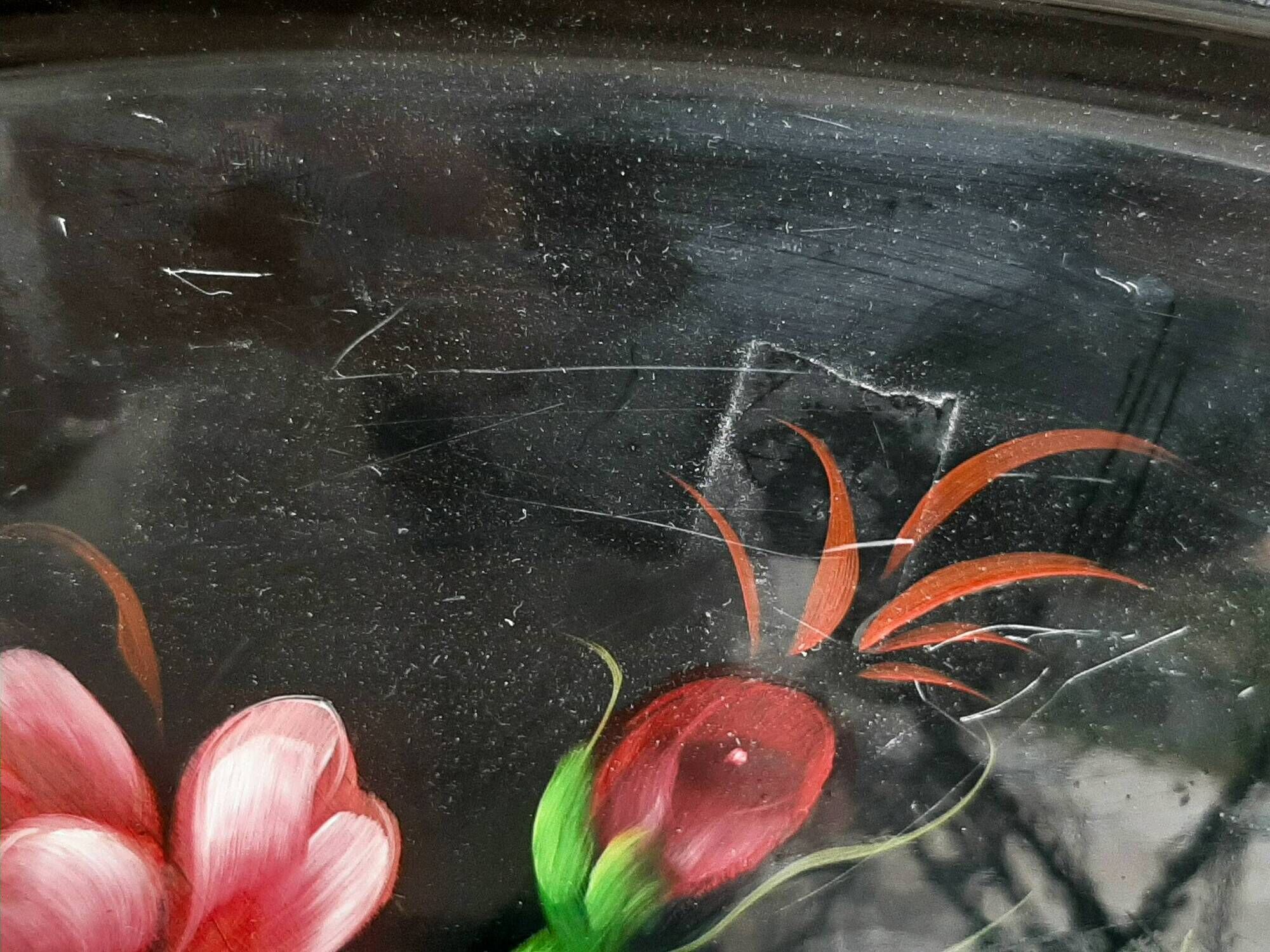 Black lacquered metal tray with multicoloured vintage Russian floral decoration.