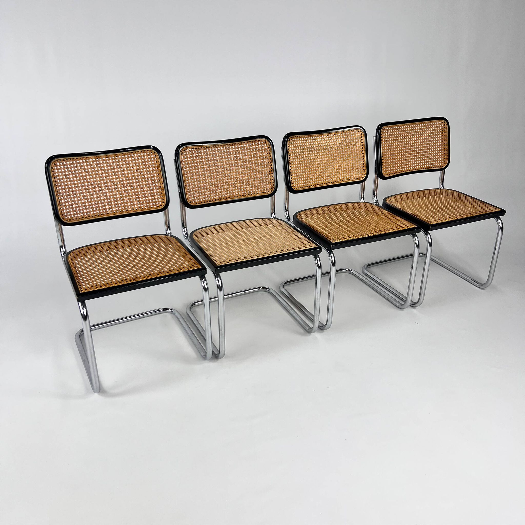 Set of 4 Tubular Frame and Cane Cantilever dining chairs, Italy, 1970s
