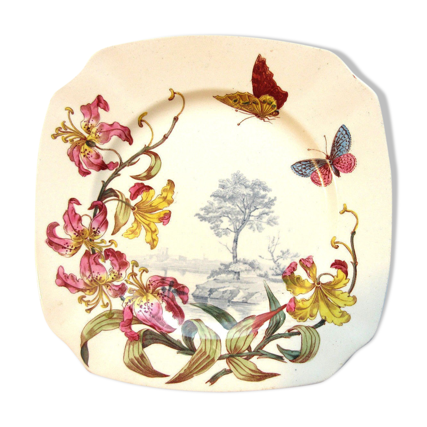 Assiette polychrome signée Kg Luneville 19ème lys et papillons