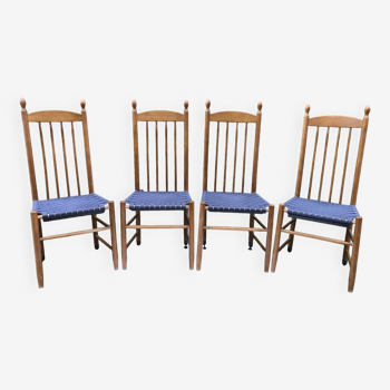 4 chaises vintage Roche Bobois années 80 en hêtre à assises tressées en tissu bleu.
