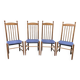 4 vintage Roche Bobois chairs from the 80s in beech with woven seats in blue fabric.