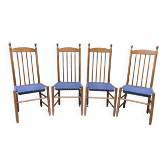 4 chaises vintage Roche Bobois années 80 en hêtre à assises tressées en tissu bleu.