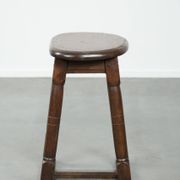 Antique Dutch oak stool from the early 19th century with a nice design