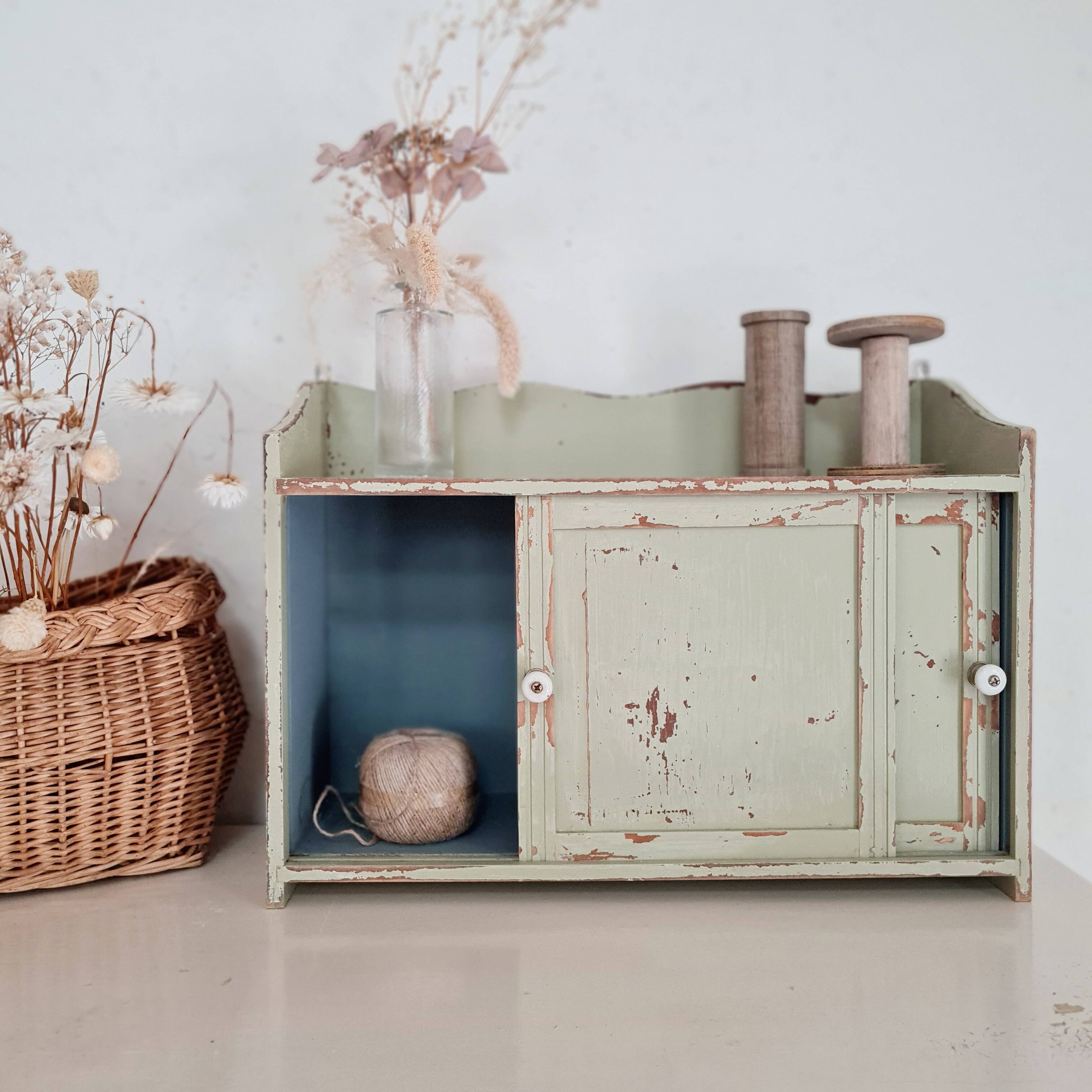 Small old wall shelf with sliding doors