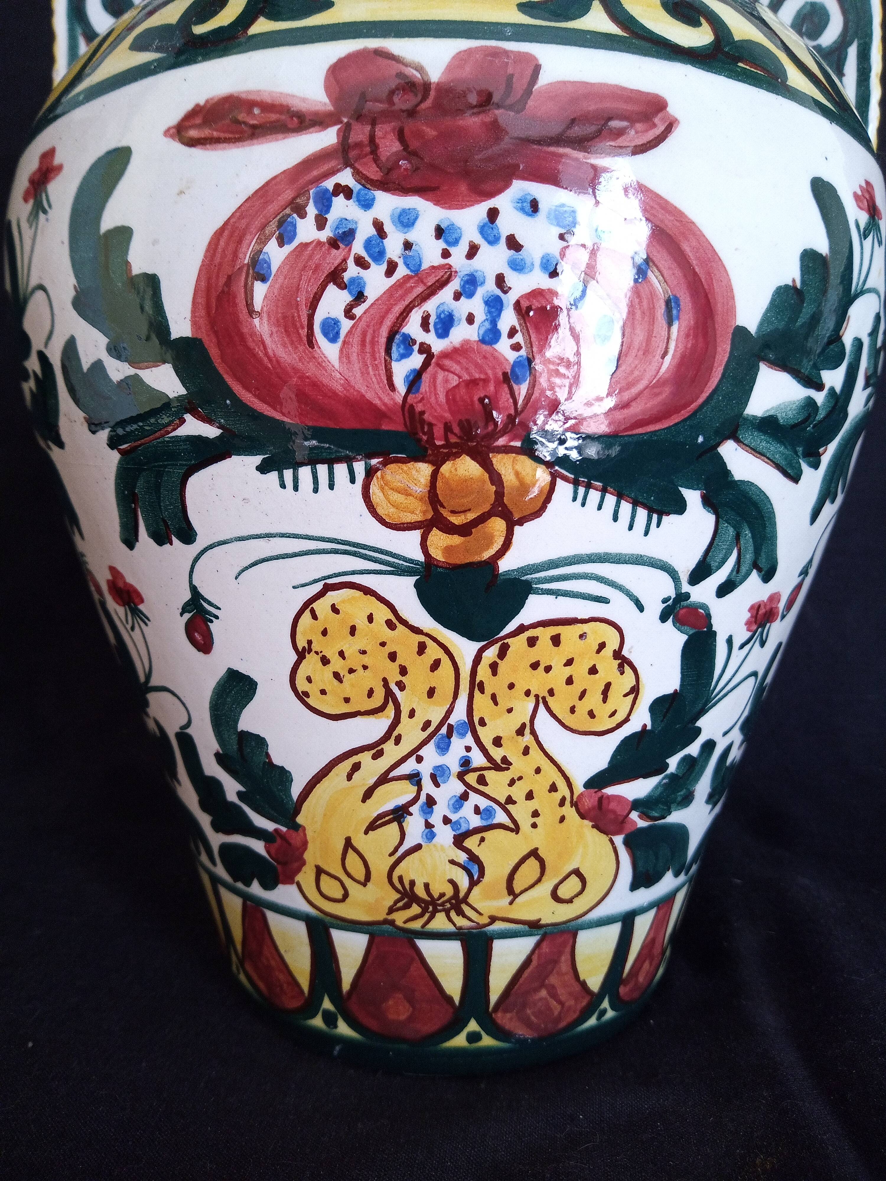 Art Deco ceramic vase with brightly colored abstract patterns