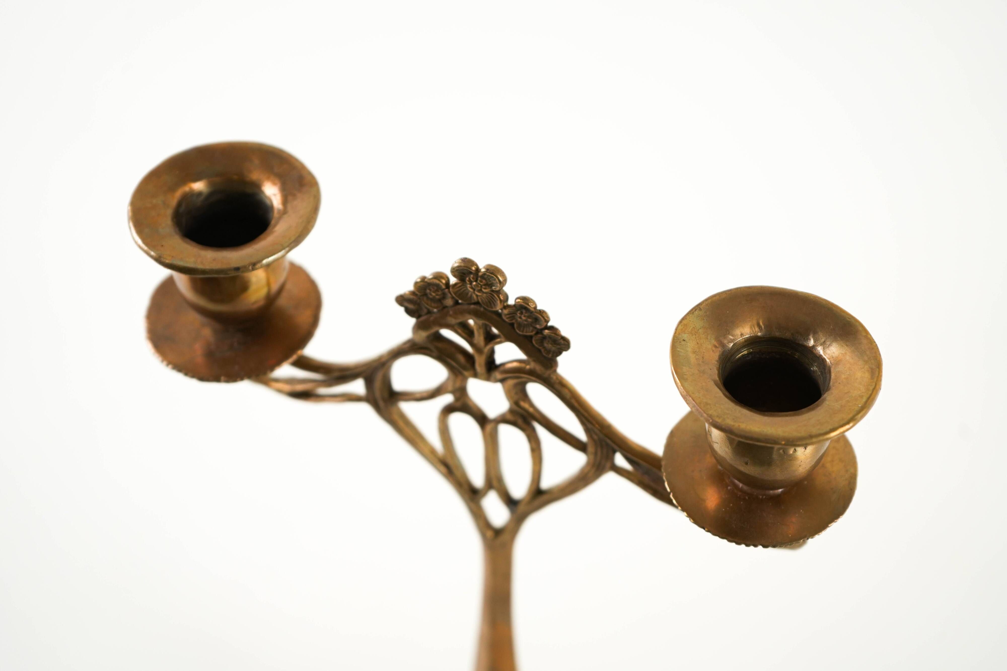 Art Nouveau brass candlestick with floral ornamentation, two arms, European