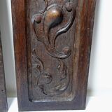 Pair of decorative wall panels in carved wood from the 19th century.