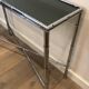 Console and chrome faux-bamboo mirror