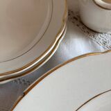 Service of 53 pieces of plates and dishes by Villeroy & Boch in cream and gold, model Saar.